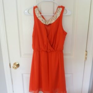 Coral and gold cocktail dress